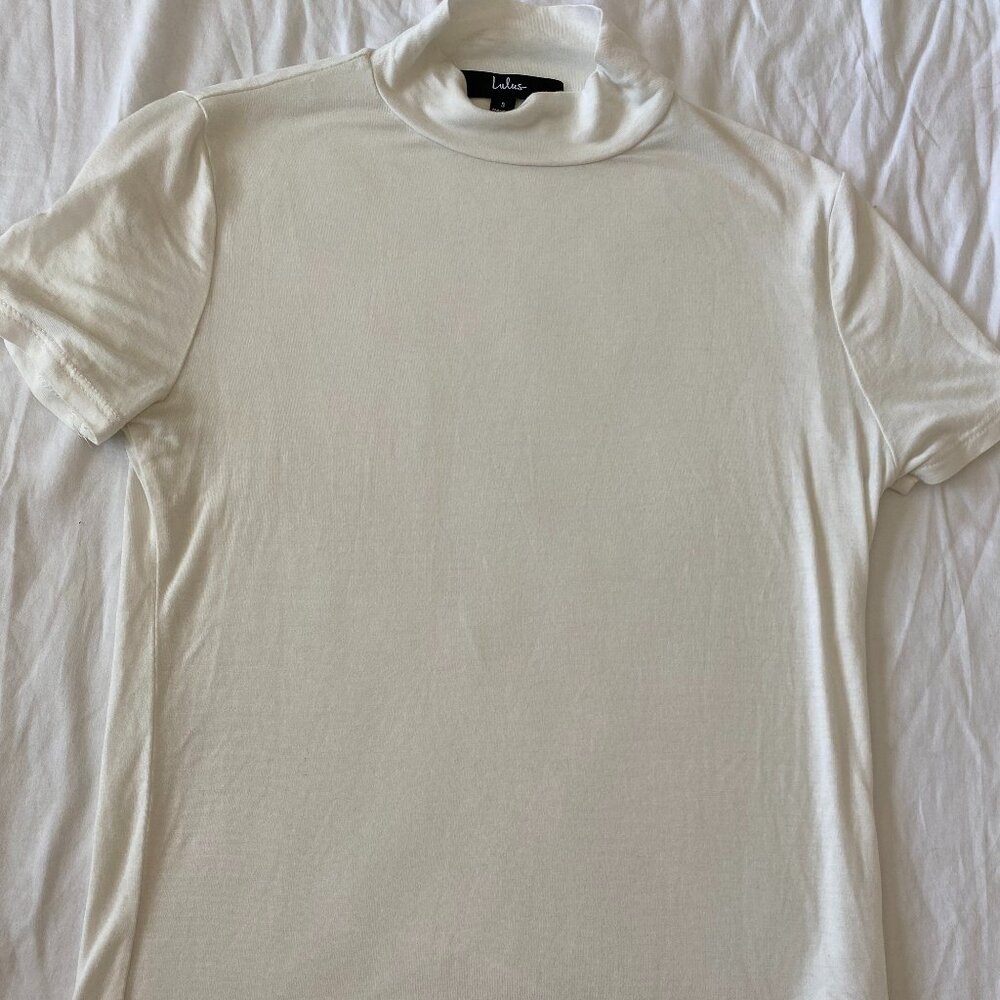Lulus full length tight tee shirt with small turtle neck. Size: Small